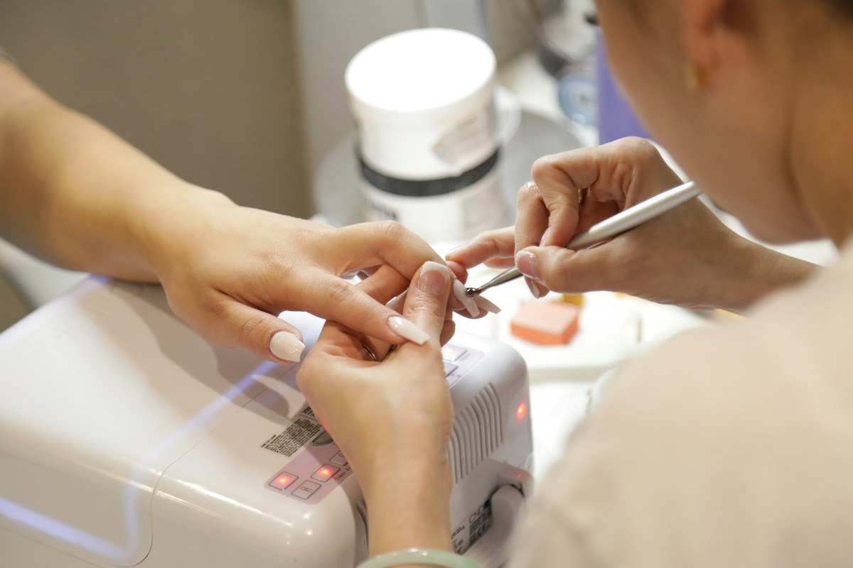 A carefully detailed manicure in progress